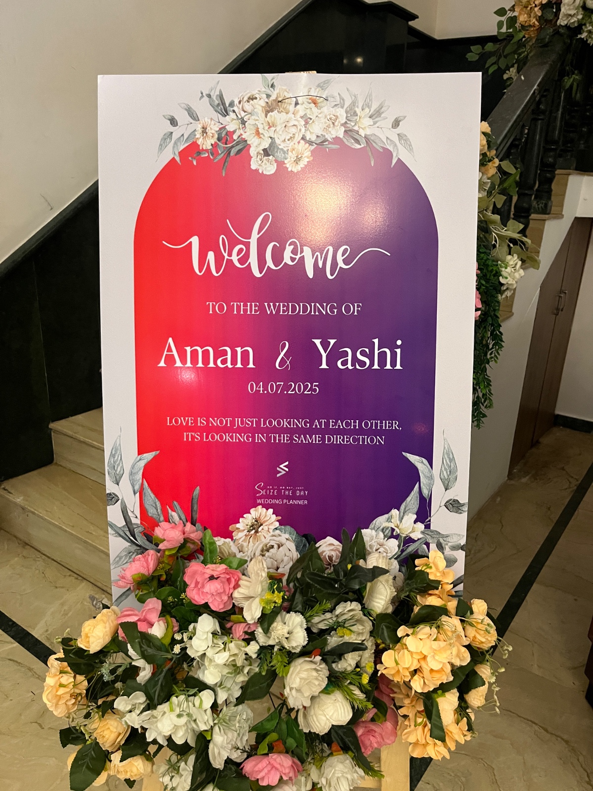 Wedding welcome board with flowers